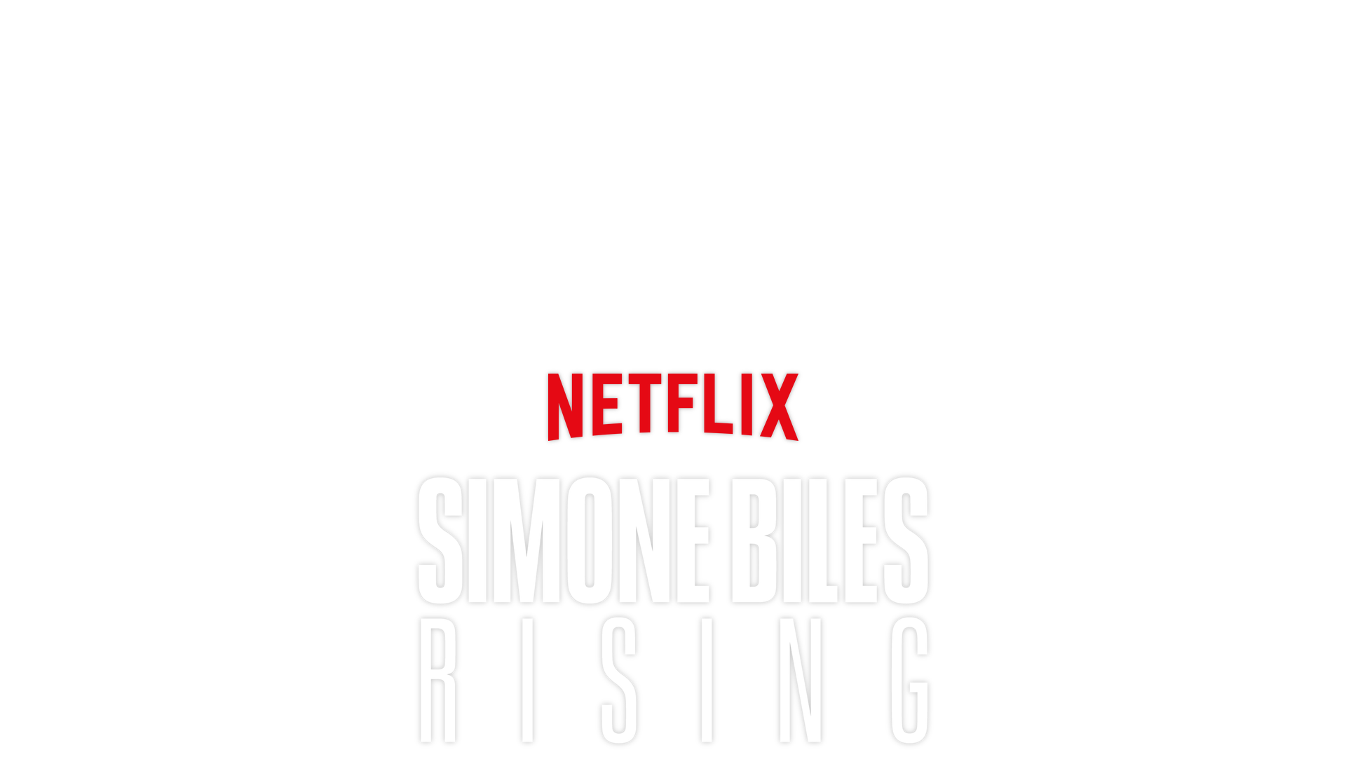 Simone Biles jumping while performing. 