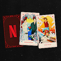Three playing cards on a black surface: one with the Netflix logo, one shows Bridgerton characters in formalwear, and one shows One Piece anime characters with bright cartoon backgrounds and settings.