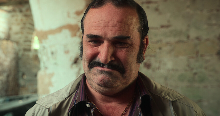 A character from Framed! A Sicilian Murder Mystery