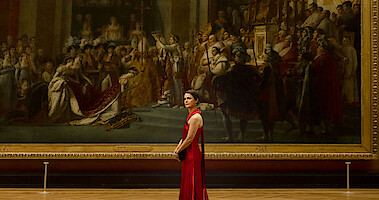 Keri Russell as Kate Wyler wears red dress in The Diplomat Season 1.