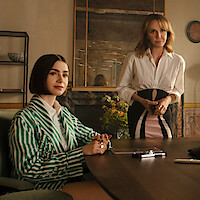 Lily Collins as Emily and Philippine Leroy-Beaulieu as Sylvie Grateau in ‘Emily in Paris’ Season 5.