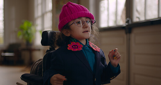 Esperanza in a pink hat