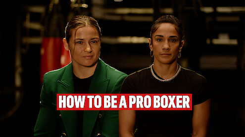 Katie Taylor and Amanda Serrano in front of a boxing gym background.