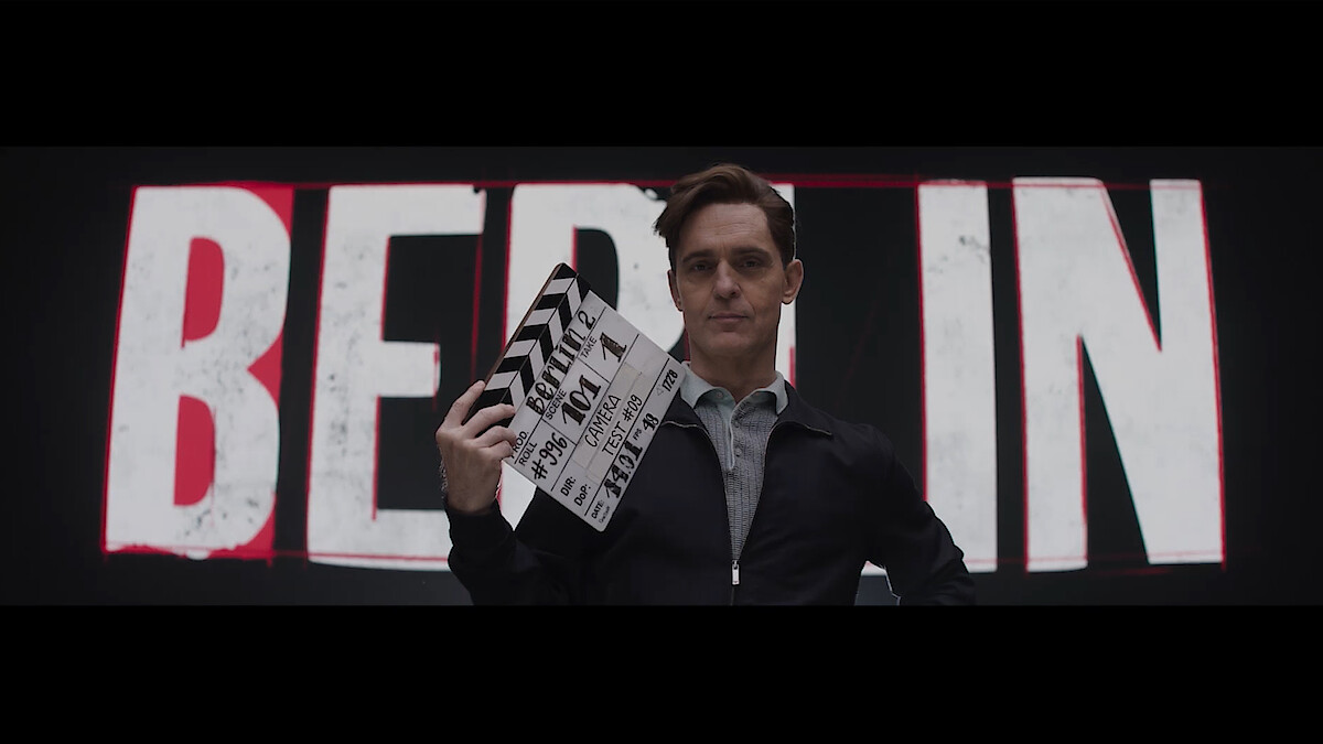 Pedro Alonso using a film clapboard