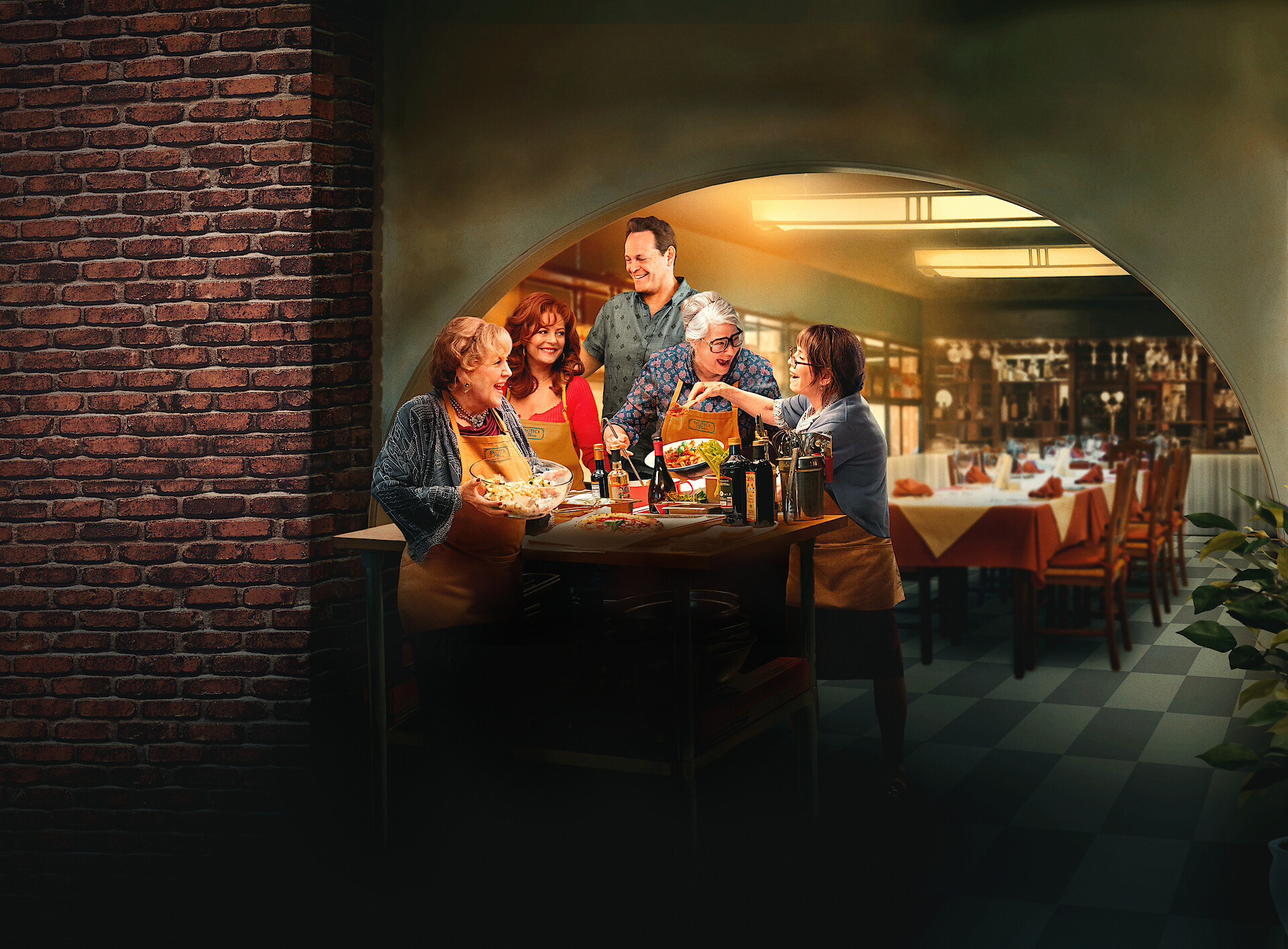 Nonnas - Vince Vaughn and the cast of 'Nonnas' in a kitchen enjoying a meal. 