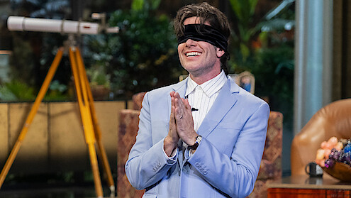 John Mulaney blindfolded