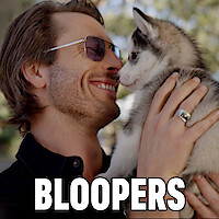 Glen Powell (Gary Johnson) smiles at a Siberian Husky puppy he's holding. The word "Bloopers" is written in block letters in front.