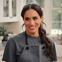 Roy Choi and Meghan high-fiving.