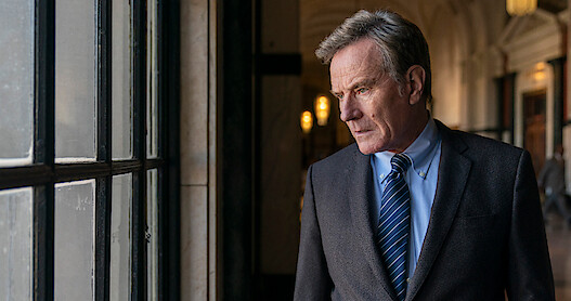 Bryan Cranston as Michael Desiato looks out of a window in Season 1 of 'Your Honor'