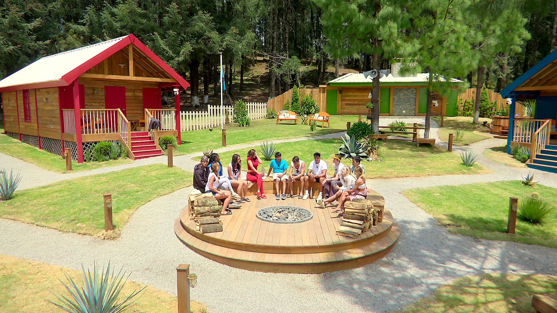 Battle Camp - The cast of Battle Camp on a circular stage in a park.