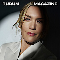 Kate Winslet with a spotlight on her face.
