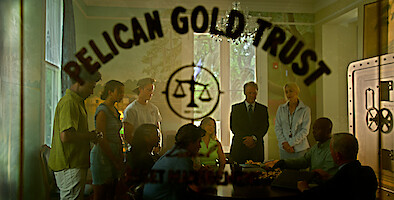 The Pogues getting their gold weighed at the Pelican Gold Trust