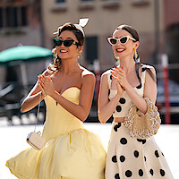 Ashley Park as Mindy and Lily Collins as Emily in 'Emily in Paris' Season 5.