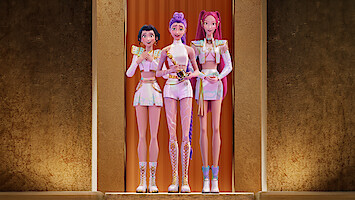 Zoey, Rumi, and Mira of KPop Demon Hunter's HUNTR/X stand on a golden stage accepting their Oscar's statuette.