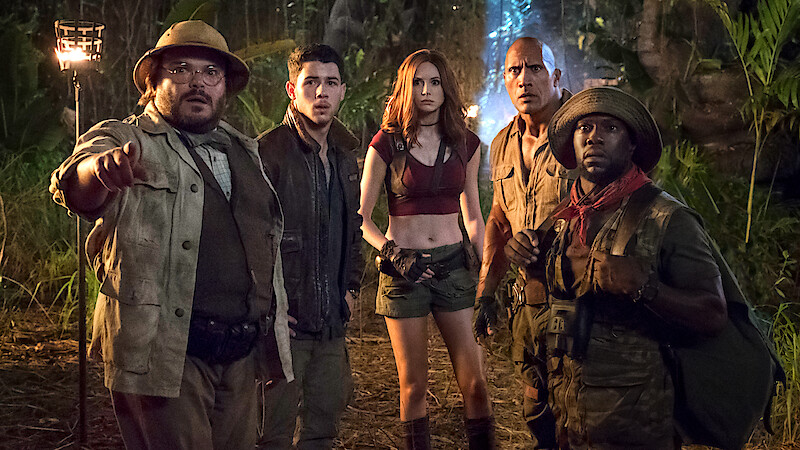 Jack Black, Nick Jonas, Karen Gillan, Dwayne Johnson and Kevin Hart look out for predators in 'JUMANJI: WELCOME TO THE JUNGLE.'