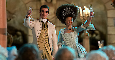 Corey Mylchreest as Young King George and India Amarteifio as Young Queen Charlotte