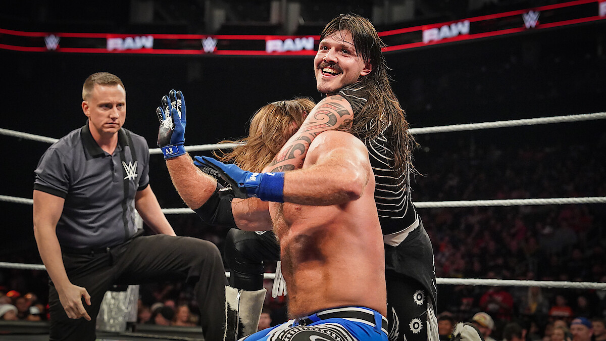 Dominik Mysterio chokes AJ Styles at WWE Raw