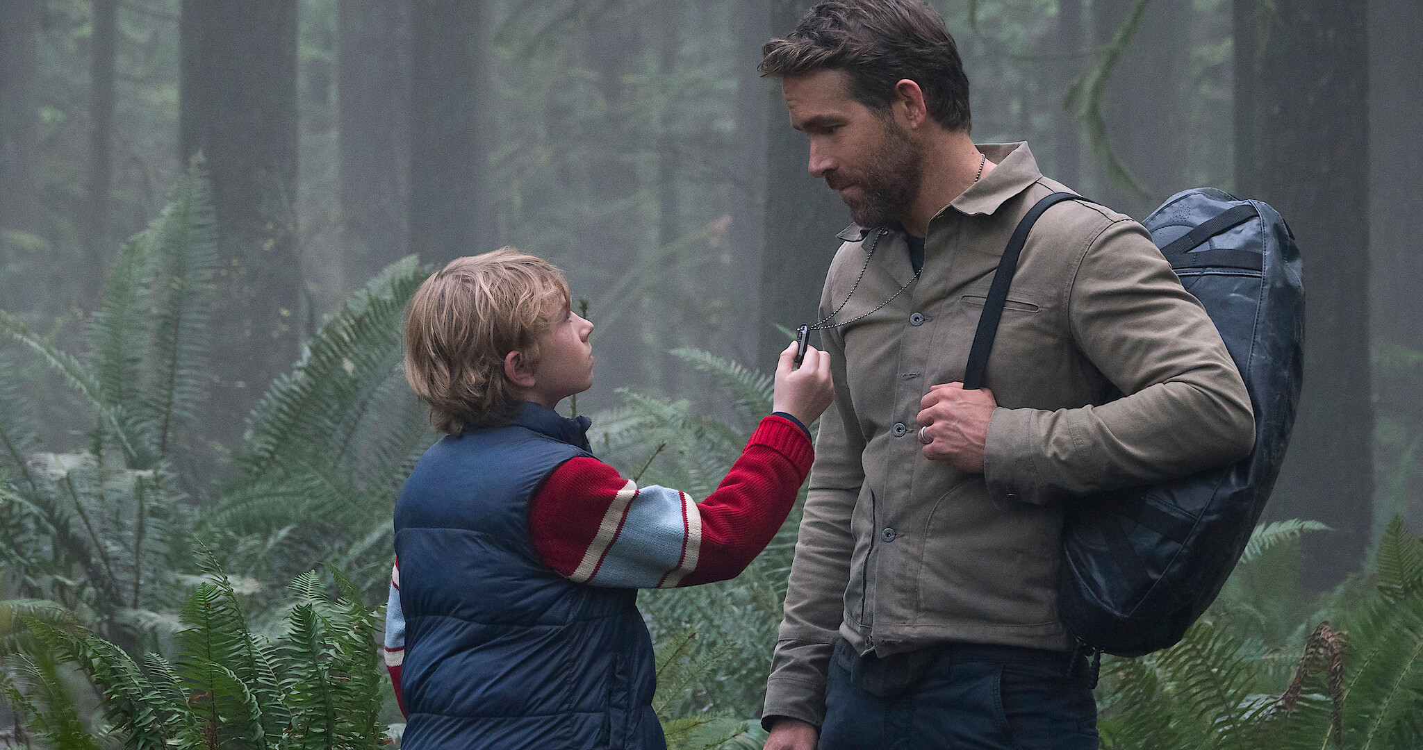 Walker Scobell and Ryan Reynolds in a scene from The Adam Project
