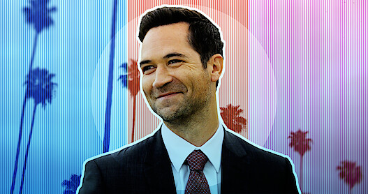 Mickey Haller, played by Manuel Garcia-Rulfo, against a colorful background of palm trees