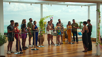 'Love is Blind: UK' couples standing with hosts Emma and Matt Willis.