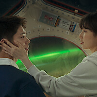 Suzy rests her hand on Park Bo Gum's cheek in an image from the film 'Wonderland.'