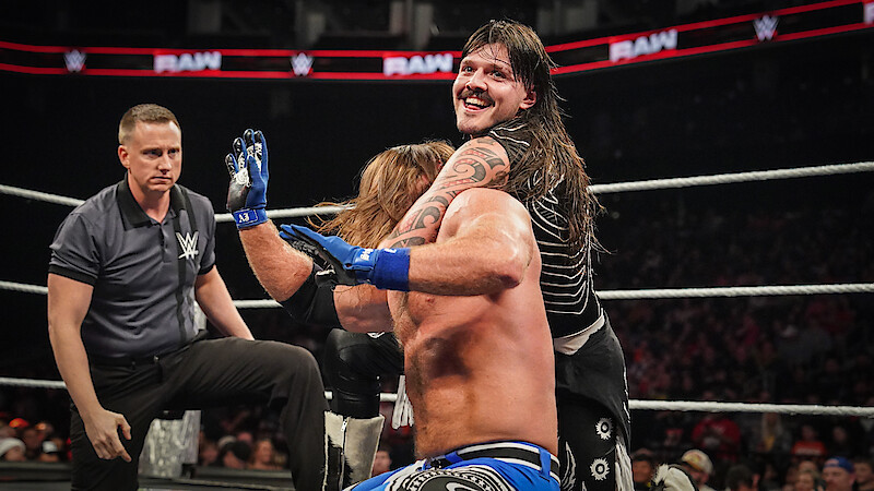 Dominik Mysterio chokes AJ Styles at WWE Raw