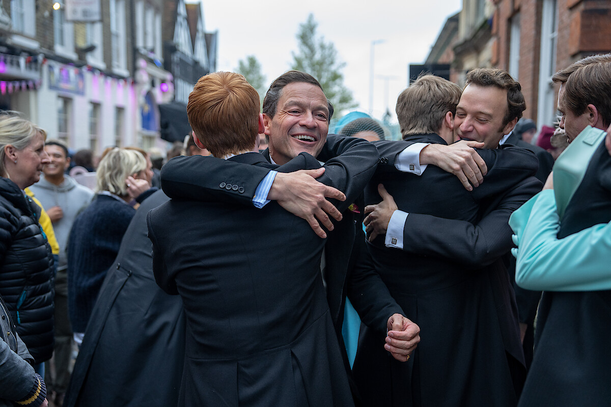 Dominic West hugs Luther Ford while celebrating the final day of filing Season 6 Part 2 of 'The Crown' 