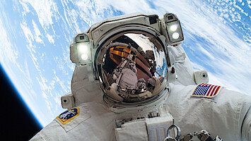 Astronaut floating in space.