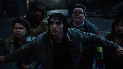 Winona Ryder as Joyce Byers, Finn Wolfhard as Mike Wheeler and Jake Connelly as Derek in 'Stranger Things 5'