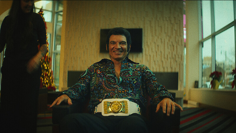  Jack Curtis sits in a chair.