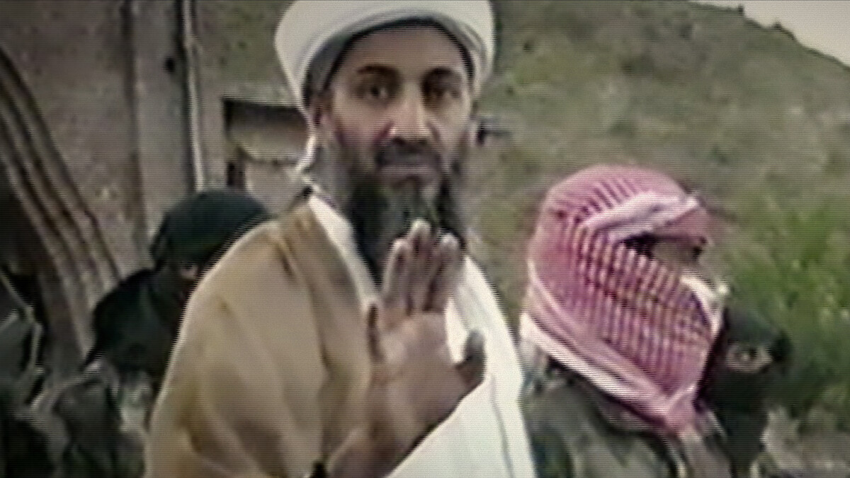 Osama bin Laden waving hand