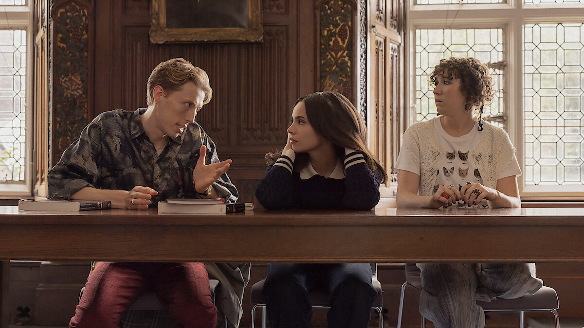 Harry Trevaldwyn as Charlie, Sofia Carson as Anna and Esmé Kingdom as Maggie talk in a classroom in 'My Oxford Year.'