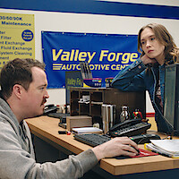 Shane Gillis as Shane and Veronika Slowikowska in 'Tires' Season 2.