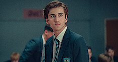 Sebastian Croft as Ben Hope wearing a school uniform in Season 2 of 'Heartstopper.'