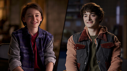 Split image featuring a younger Noah Schnapp on the left and an older version on the right, both seated indoors, smiling, and dressed casually in soft, natural lighting.