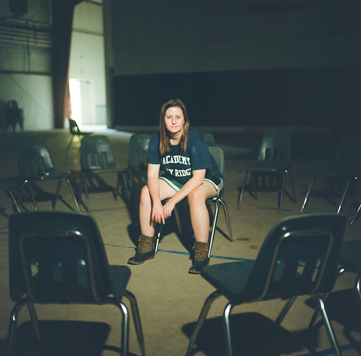 Katherine Kubler sits in a chair at The Academy at Ivy Ridge