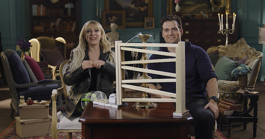 Henry Cavill and Millie Bobby Brown Sitting