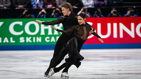 Glitter & Gold: Ice Dancing. (L to R) Evan Bates and Madison Chock at the ISU Grand Prix in Nagoya Japan. Cr. Alan Clarke/Netflix © 2026