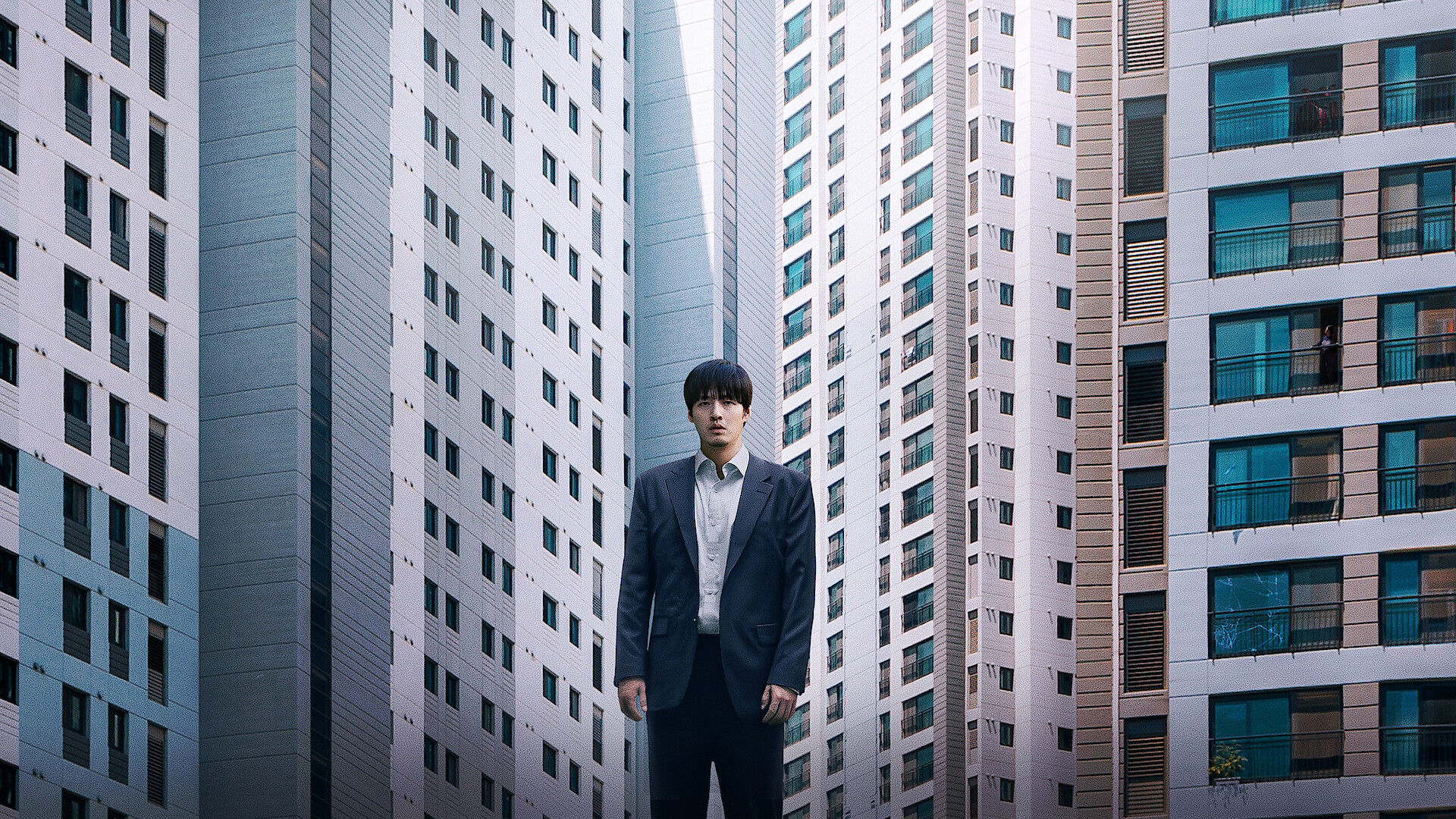 Wall to Wall - A character standing in front of an impossibly tall skyscraper