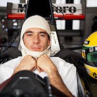 Ayrton Senna in the driver's seat of his Honda Marlboro McLaren McLaren MP4/6 Honda RA121E 3.5 V12 racing car with his custom racing helmet during testing in Jerez, Spain, circa February 1991