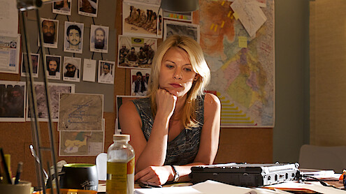  Claire Danes as Carrie Matheson listens to surveillance recordings in 'Homeland.'