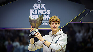 Jannik Sinner of Italy poses for a photo with the trophy following victory in his Men's Singles Final match against Carlos Alcaraz.