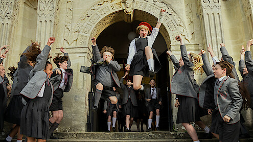 Roald Dahl's Matilda the Musical. (L to R) Charlie Hodson-Prior as Bruce Bogtrotter, Meesha Garbett as Hortensia in Roald Dahl's Matilda the Musical. Cr. Dan Smith/Netflix © 2022