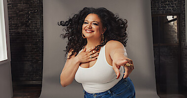Portrait of Michelle Buteau.