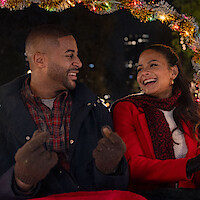 Devale Ellis as Teddy and Christina Milian as Layla in ‘Meet Me Next Christmas’