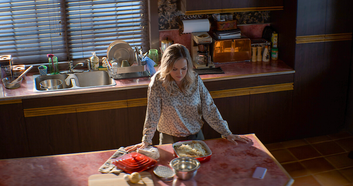 Kathleen at the kitchen counter