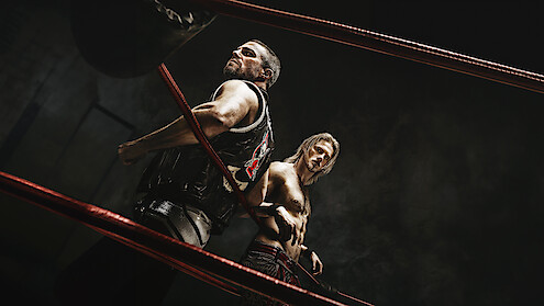 Story art for the wrestling show 'Heels', featuring two men in the ring.