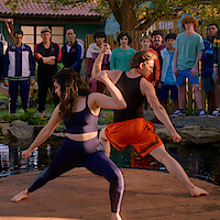 Students train at the dojo on a floating platform in Season 5 of 'Cobra Kai'