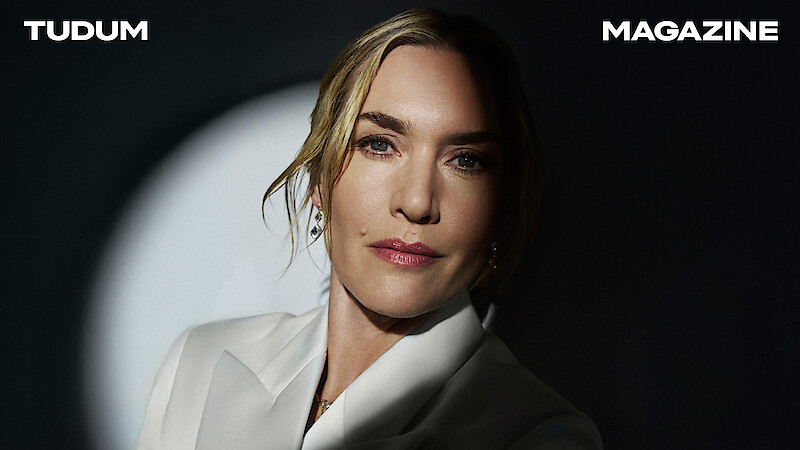 Kate Winslet with a spotlight on her face.