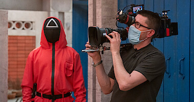 A cameraman filming 'Squid Game: The Challenge'.